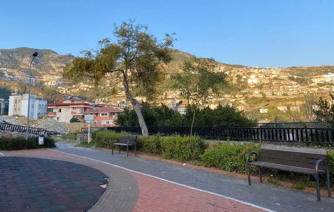 A nice small park with a kids' playground and a great view. It's not worth a special trip, but if