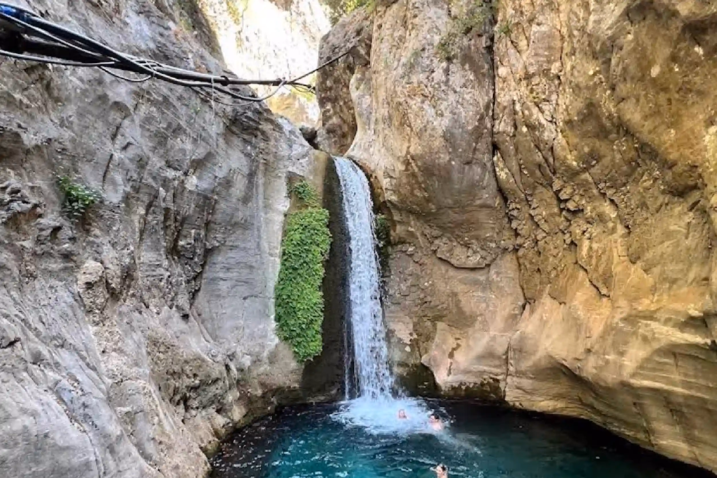 A must-visit canyon surrounded by gorgeous mountains! Walk along a wooden bridge over the river,